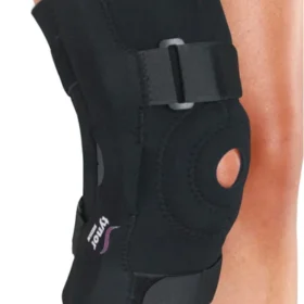 Tynor's Knee Wrap Hinged (Neo). Key features of this product include: Stability and Support: Provides stability and support to the knee joint, aiding in faster recovery from various knee issues. Geared Biaxial Hinge: Features a rigid splint with a geared biaxial hinge that offloads the knee joint and mimics natural knee movement. Material: Made from high-quality neoprene material, which offers strong compression, stability, and improved blood circulation around the knee. Design: The wraparound design ensures ease of wear and allows for a customizable grip. Patella Pressure: A frontal opening helps reduce pressure on the patella (kneecap).