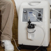 5-liter oxygen concentrator is a medical device that provides supplemental oxygen to individuals with respiratory conditions. It works by separating oxygen from the air and delivering it through a nasal cannula or mask, typically at a flow rate of up to 5 liters per minute. These devices are used to treat various conditions that cause low blood oxygen levels, such as COPD, pulmonary fibrosis, and heart failure. Uses: Treating Hypoxia: The primary use is to increase blood oxygen levels in individuals experiencing hypoxemia (low blood oxygen). Respiratory Conditions: It's commonly used for patients with COPD, asthma, pulmonary fibrosis, and other lung diseases. Cardiovascular Issues: May be used to support patients with heart failure or other conditions affecting oxygen circulation. Post-Surgery: Can aid in recovery after certain surgeries, particularly those affecting the respiratory system. Carbon Monoxide Poisoning: In emergency situations, it can be used to help reverse the effects of carbon monoxide poisoning. Specifications: Oxygen Flow Rate: 5 liters per minute (LPM). Oxygen Concentration: Typically delivers oxygen purity between 87% and 96%. Power Source: Usually powered by electricity (AC or DC) and may include battery backup for portability. Weight and Size: Can vary but are generally designed to be relatively compact and portable, with weights ranging from 15-20 kg. Noise Level: Many models are designed for quiet operation, with noise levels below 50 dB. Safety Features: Include alarms for low oxygen levels, power failure, and pressure fluctuations. Additional Features: May include humidifiers, flow meters, and remote controls.