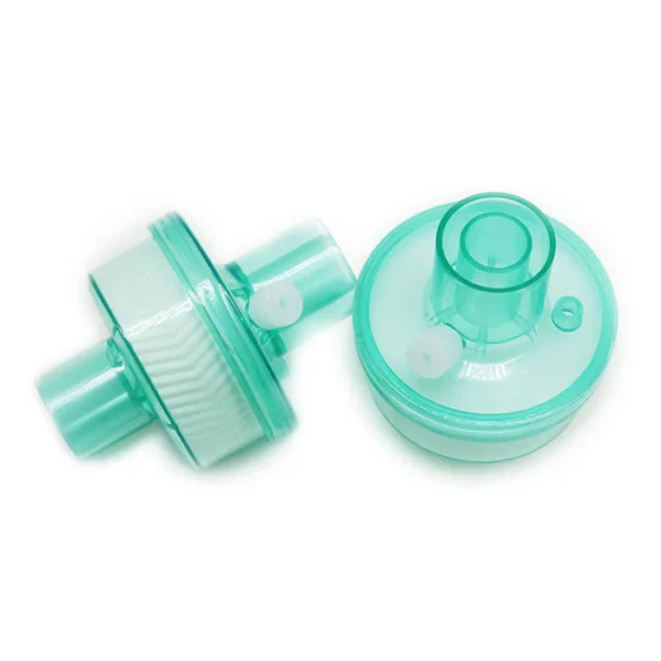 HME filters, or Heat and Moisture Exchange filters, are used to humidify and filter the air inhaled by patients, particularly those with tracheostomies or on ventilators. They work by trapping heat and moisture from exhaled air and releasing it into inhaled air, preventing airway dryness and reducing the risk of infection. Here's a more detailed explanation: Purpose: Humidification: HME filters add moisture to the air, mimicking the natural humidifying function of the upper airway, which is bypassed when using a ventilator or tracheostomy. Filtration: They also act as a filter, trapping dust, bacteria, viruses, and other particles to prevent them from entering the lungs. Reduced Mucus Production: By maintaining proper humidity, HME filters can help reduce the production of thick mucus and coughing, especially in laryngectomy patients. How they work: Heat and Moisture Exchange: The filter contains a material (like foam or a special compound) that absorbs heat and moisture from exhaled air. Re-humidification: This stored heat and moisture is then released into the next breath of inhaled air, warming and humidifying it. Passive Humidification: This process is passive, meaning it doesn't require an external power source like active humidifiers. Clinical Applications: Mechanical Ventilation: HME filters are crucial for patients on ventilators to prevent airway dryness and complications associated with long-term ventilation. Tracheostomy Patients: They are used to humidify and filter air for individuals with tracheostomies, helping them breathe more comfortably. Home Care: HME filters are also used in home care settings for patients requiring respiratory support. Anesthesia: HME filters are also used during anesthesia to maintain airway humidity. Key Benefits: Reduced Risk of Infection: Filtration helps protect the patient from airborne pathogens. Improved Patient Comfort: Maintaining proper humidity and reducing mucus production enhances patient comfort. Simplified Care: HME filters are relatively simple to use and require minimal maintenance. Reduced Risk of Complications: They help prevent complications like endotracheal tube occlusion and ventilator-associated pneumonia.