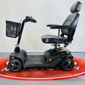 Abilize Stride Comforter mobility scooter. Its specifications include: Maximum Range: Up to 17 miles (27 km) on a full charge, supported by a 22 Ah battery pack. Maximum Carrying Capacity: 21.5 stone (approximately 136 kg). Maximum Speed: 4 mph (approximately 6.4 km/h). Battery: 22 amp lead acid batteries, which are rechargeable and can be charged on or off-board. Features: Includes a padded Captain's Seat, rear suspension, front & rear lights, and solid puncture-proof tires. Portability: Designed to be easily disassembled for transportation, with removable seat, batteries, rear wheels/motor section, and a folding tiller.