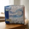 TENA Dry Comfort Protective Underwear, Large, 18 count. The specifications and features of this product are: Product: TENA Dry Comfort Protective Underwear Size: Large (L) Waist/Hip Size: 45"-58" (114 cm-147 cm) Count: 18 underwear per package Absorbency: Moderate to heavy protection Material: Soft, cloth-like, and breathable Design: Designed to feel and fit like regular underwear. Features soft waist elastics and gentle leg gathers for a secure and comfortable fit. Includes a target acquisition zone and DuoLock® Core Technology to lock away wetness and control odor. Tear-away sides allow for easy changes.