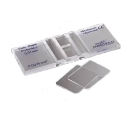 Neubauer counting chamber is a thick glass slide with a specialized grid used under a microscope to manually count cells in a liquid sample, such as blood or sperm. It has a precisely known volume, allowing for the calculation of cell concentration in a sample by counting cells within a specific area and then extrapolating that number to the total volume. Key features include a grid with different sized squares to count various cell types, a standardized depth of 0.1 mm, and the ability to load two samples independently.   Key features and function Material and construction: It is a thick glass slide, measuring approximately \(30\text{\ mm}\times 70\text{\ mm}\times 4\text{\ mm}\).  Counting grid: The central area features a double grid, and each side has a \(3\text{\ mm}\times 3\text{\ mm}\) counting area.  Grid subdivisions: Each \(3\text{\ mm}\times 3\text{\ mm}\) square is divided into nine large \(1\text{\ mm}\times 1\text{\ mm}\) squares.  The central large square is further subdivided into 25 smaller squares, which are then divided into 16 tiny squares, resulting in a total of 400 small squares within the central square. This area is used for counting red blood cells and platelets.  The four corner large squares are used for counting white blood cells because of their lower concentration, which requires a larger area for a more accurate count.  Standardized depth: The chamber is designed to maintain a precise depth of \(0.1\text{\ mm}\) between the bottom of the grid and the specialized coverslip.  Volume calculation: The standardized depth allows for the calculation of volume. For example, one of the nine large squares represents a volume of \(0.1\text{\ L}\) (\(1\text{\ mm}\times 1\text{\ mm}\times 0.1\text{\ mm}\)).  Methodology: A diluted and well-mixed cell suspension is carefully applied to the chamber.  Using a microscope, cells are counted within a specific, predetermined area of the grid.  The number of cells counted is then used to calculate the total cell concentration in the original sample, using the known volume of the counting area.  Common applications: It is used to count various blood cells (red blood cells, white blood cells, platelets), bacteria, yeast, and other cells in a fluid. 