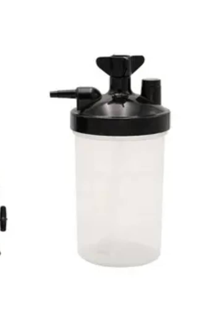 Oxygen Concentrator Humidifier Bottle – Universal Medical-Grade Moisture System for Comfortable Oxygen Therapy Reliable oxygen concentrator humidifier bottle designed to add essential moisture to oxygen flow, preventing dryness and irritation during therapy. Universal compatibility, medical-grade materials, 350–500ml capacity, and built-in safety pressure relief valve for safe and comfortable long-term oxygen therapy.