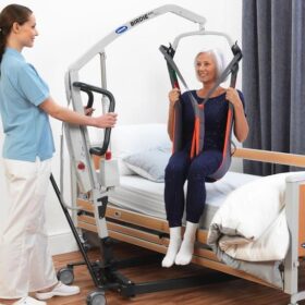 Patient hoist lift designed for safe and dignified transfer of individuals with limited mobility. Available in manual and electric models for hospitals, care homes, and home care use.